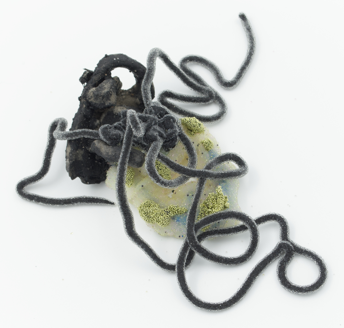 Devious Frequency 7, 2022: silicone, stoneware, air-dry clay, glass, watercolor, stainless steel wire, 6 inches x 7 inches x 3 inches