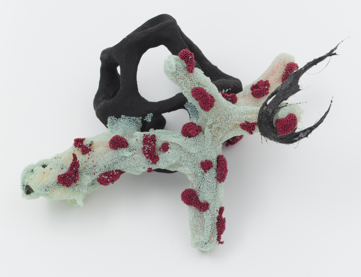 Devious Frequency 10, 2022: silicone, stoneware, air-dry clay, resin, my hair, glass, acrylic paint, 6 inches x 5 inches x 4 inches
