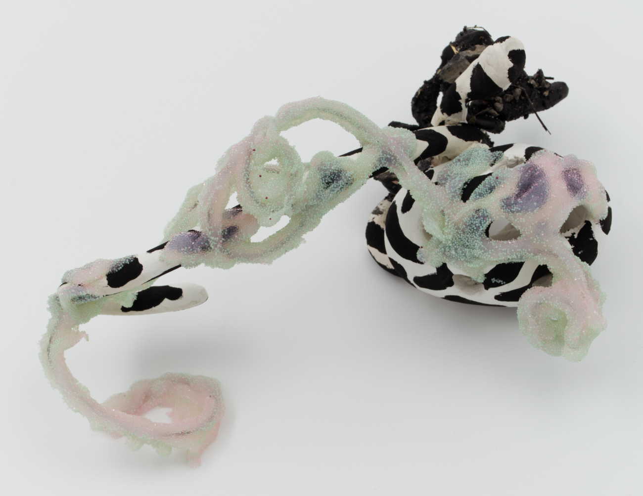 Devious Frequency 11, 2022: silicone, stoneware, air-dry clay, glass, pva, acrylic paint, dirt, rocks, grass, 8 inches x 4 inches x 4 inches