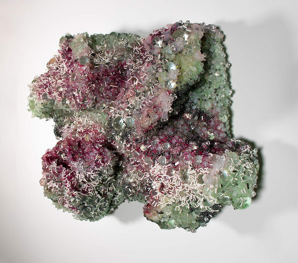 Shard No. 5 from the Watery Eye Gate Talisman, 2025: Silicone, Glass, Acrylic, Polyurethane, Epoxy resin, aluminum foil, wood, 19 inches x 15 inches x 7 inches